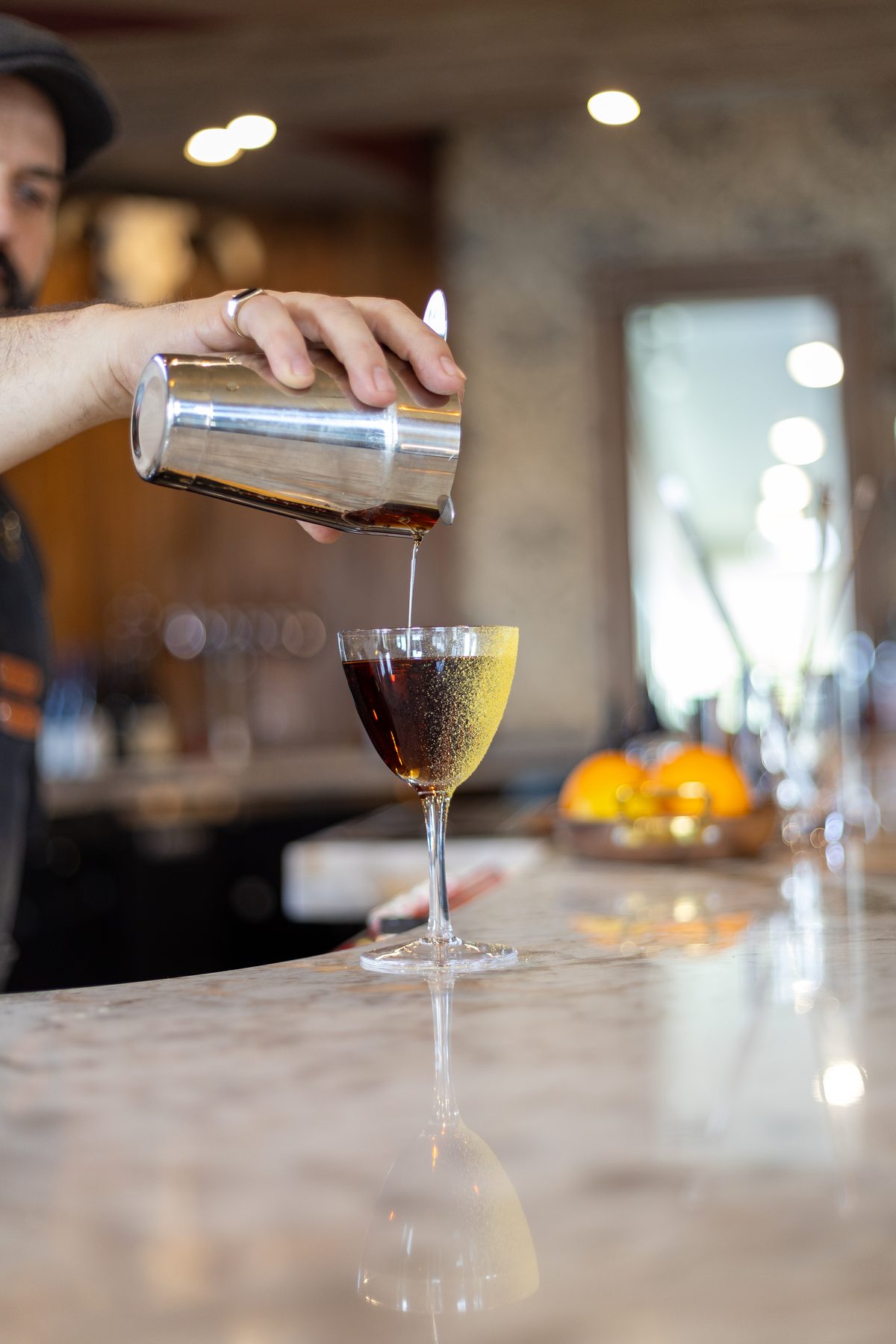 A cocktail poured at Oakhouse